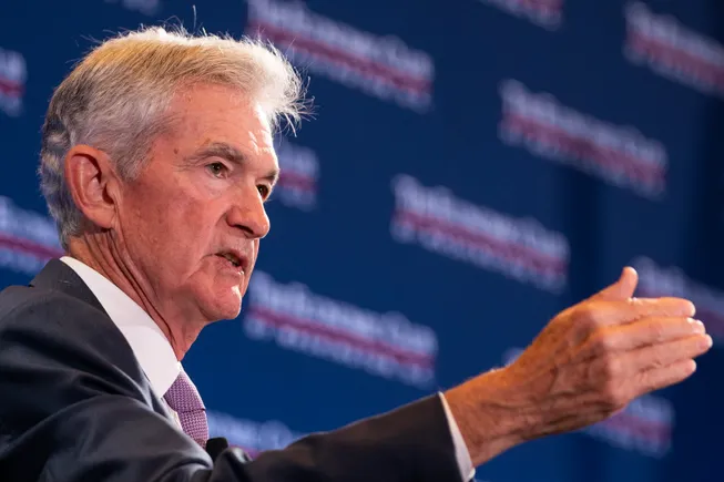 Fed holds main rate steady, highlighting signs of job market stability