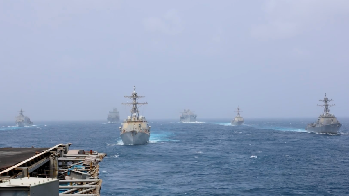 Container ship attacked in Strait of Hormuz as Iran widens war